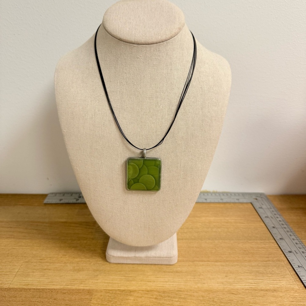 Green bubble swirl pendant necklace on cord